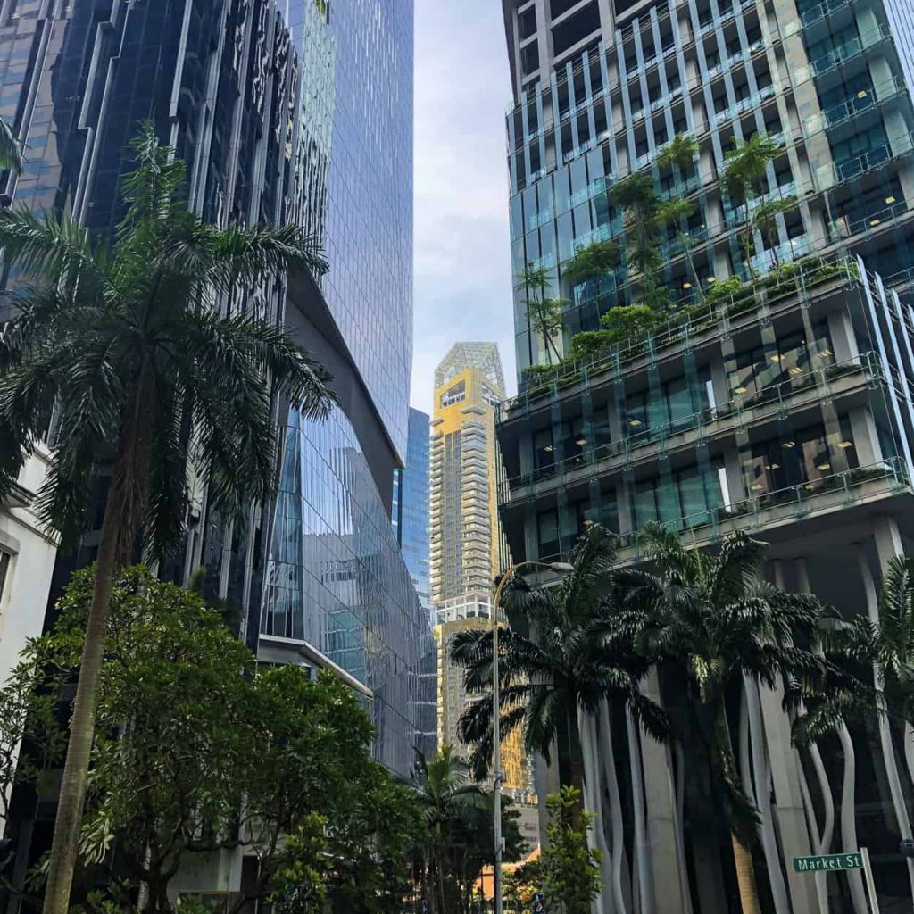 One Shenton gleams between the Singapore CBD office towers