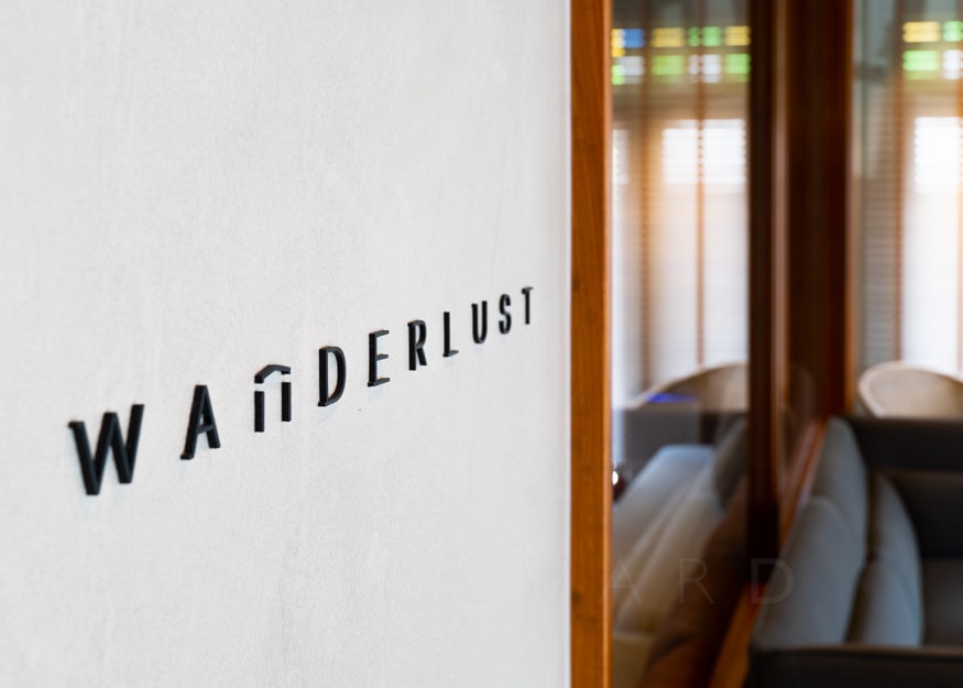 8M Wanderlust boutique hotel signage