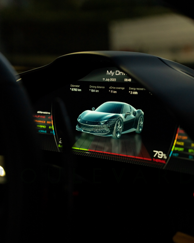 Ferrari 296 GTB sports car in motion on a scenic road